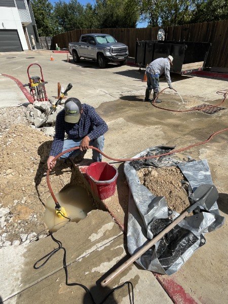 A Frame crew pouring and finishing concrete flatwork