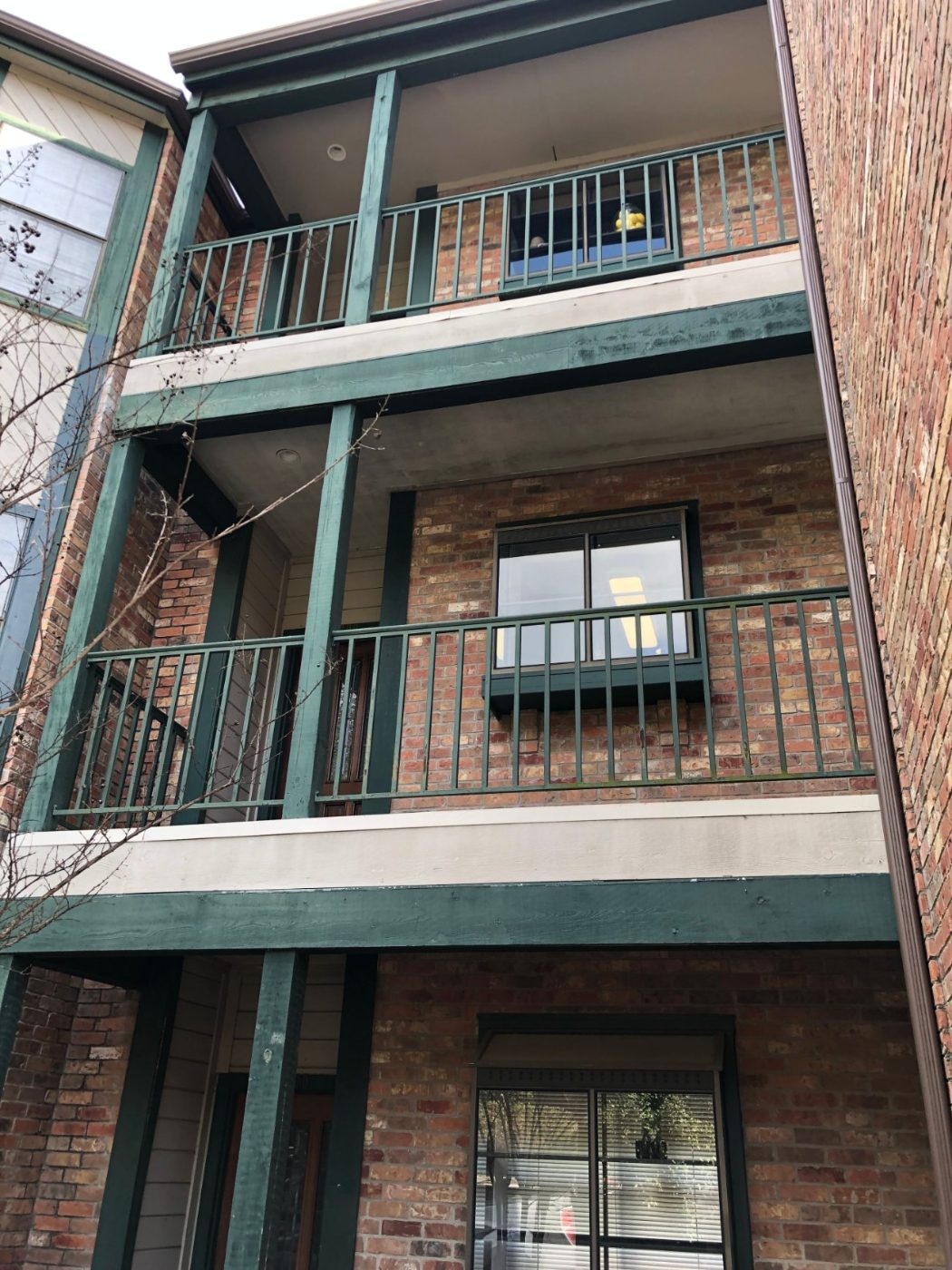 New windows across a multi-level brick building