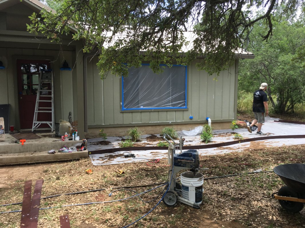 A Frame installing new planting beds and edging
